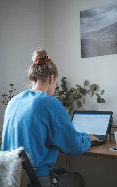 A woman working remotely
